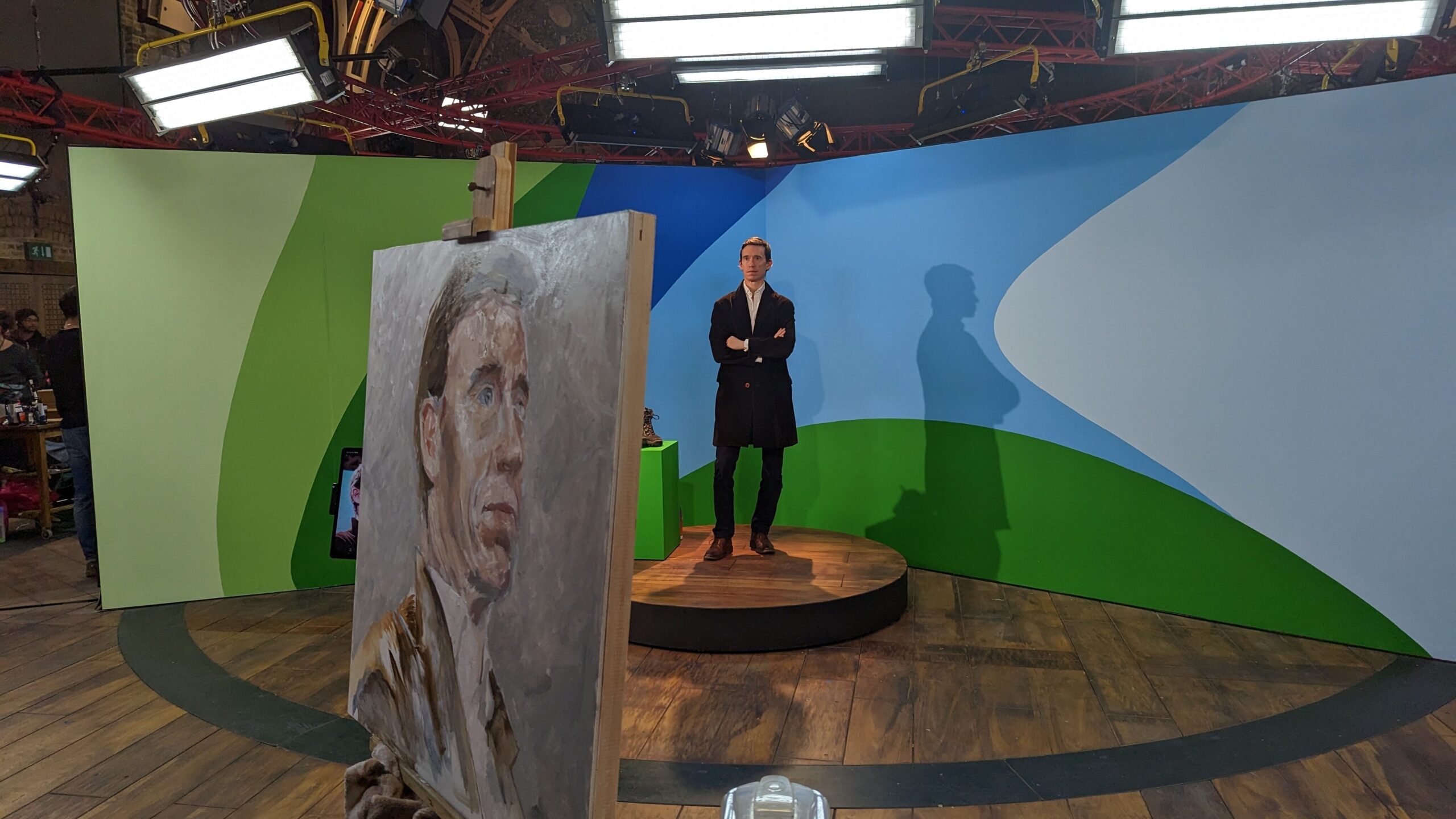 Rory Stewart with the almost final work on the set of SKY Arts Portrait Artist of the Year.